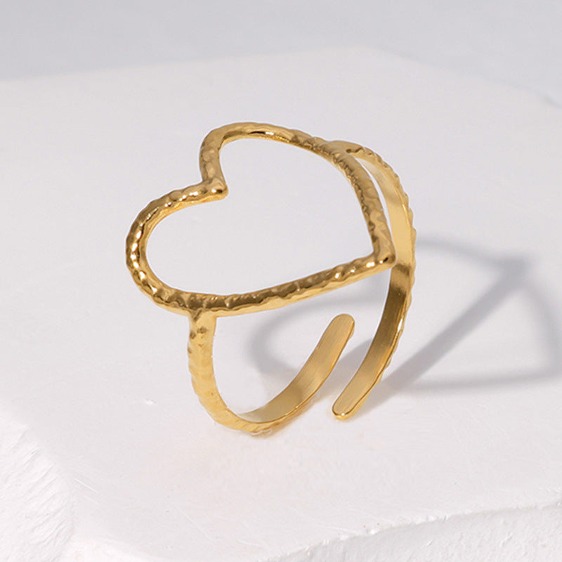 Cross-border simple hollow love titanium steel ring female open cold wind index finger ring heart-shaped stainless steel ring wholesale