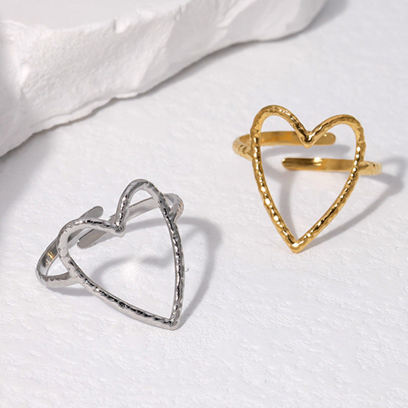Cross-border simple hollow love titanium steel ring female open cold wind index finger ring heart-shaped stainless steel ring wholesale