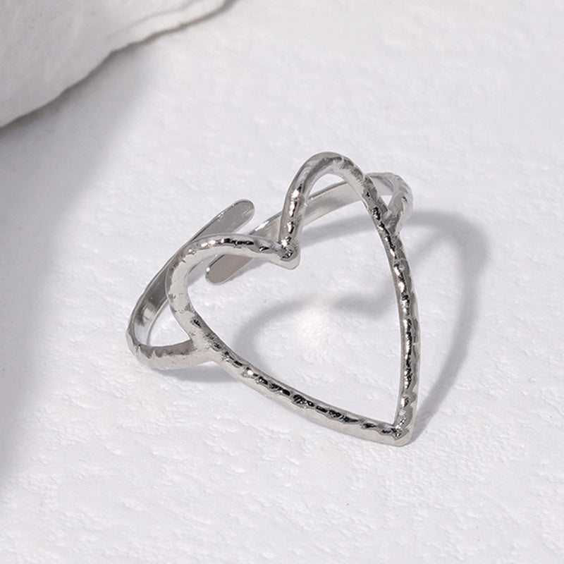Cross-border simple hollow love titanium steel ring female open cold wind index finger ring heart-shaped stainless steel ring wholesale