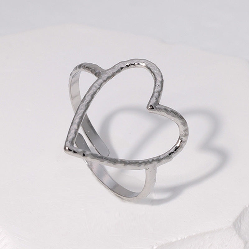 Cross-border simple hollow love titanium steel ring female open cold wind index finger ring heart-shaped stainless steel ring wholesale